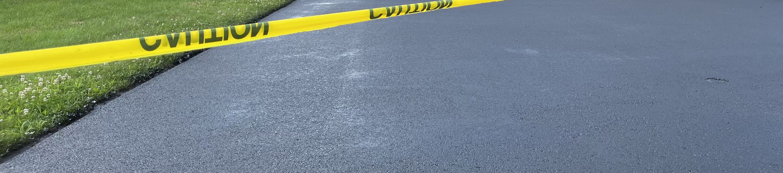 freshly paved asphalt driveway